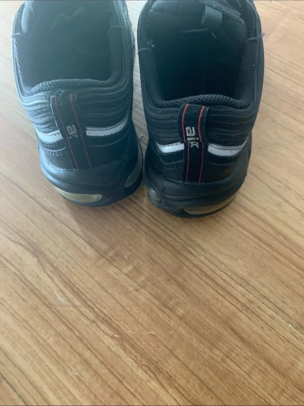 Nike Men’s Black & White Low-Top Sneakers with Red Accents
